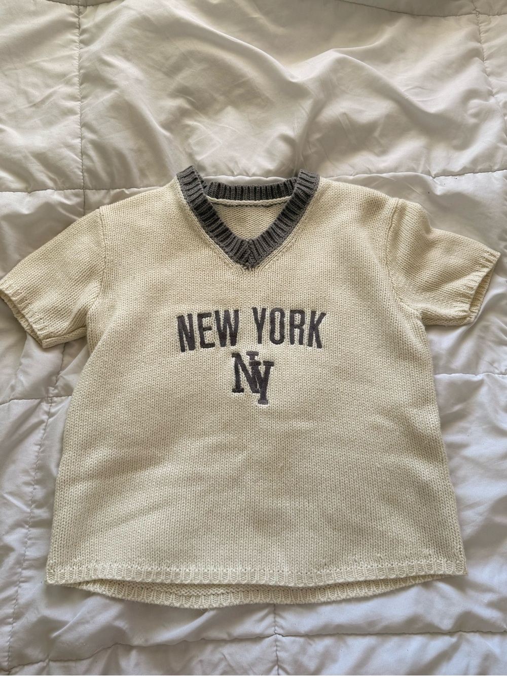 Cream "New York" V‑Neck Knit Top